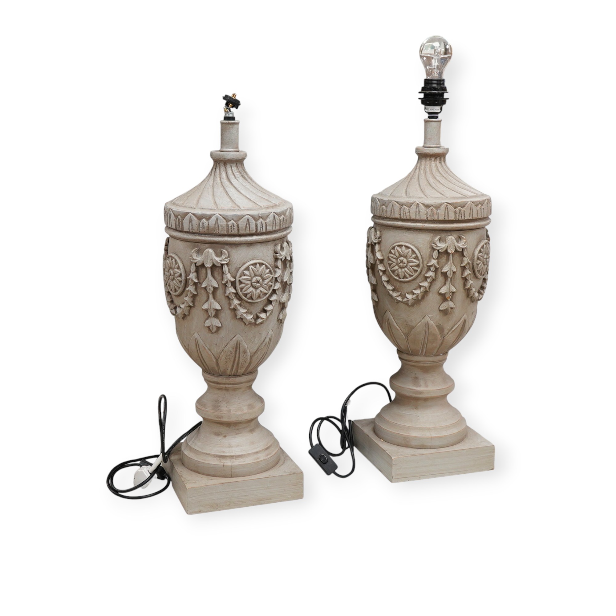 A pair of painted and carved wood lamps, 65cm to wood top
